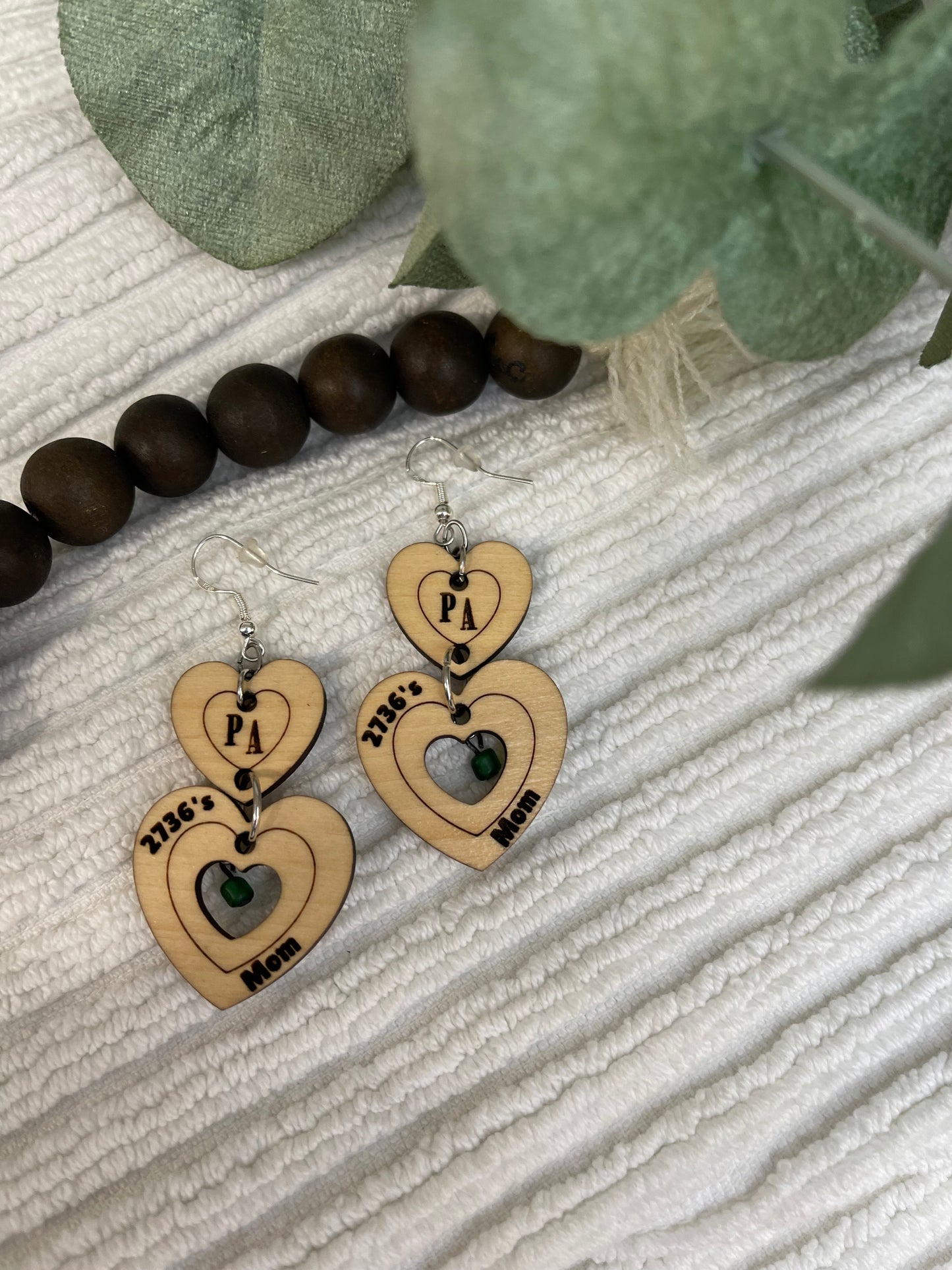 Double heart dangles with bead